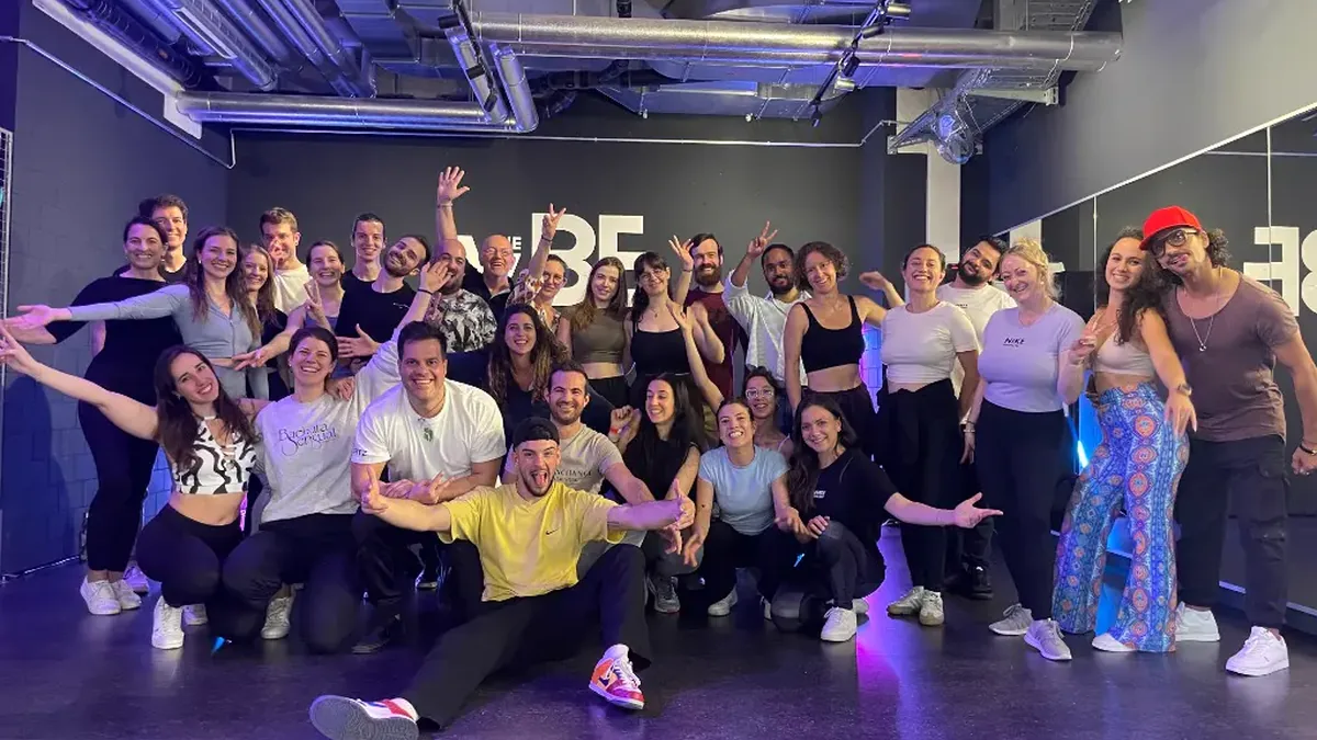 Dancers moving with rhythm and grounded energy at AXcent Dance