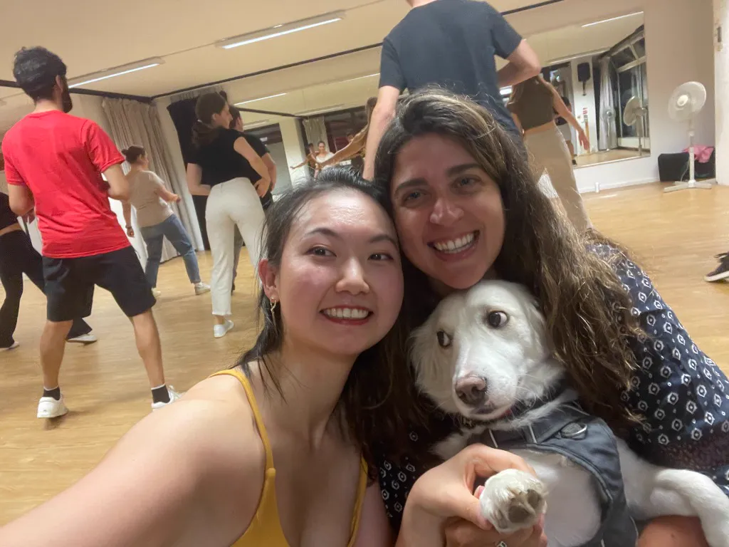 Happy students celebrating friendship through dance